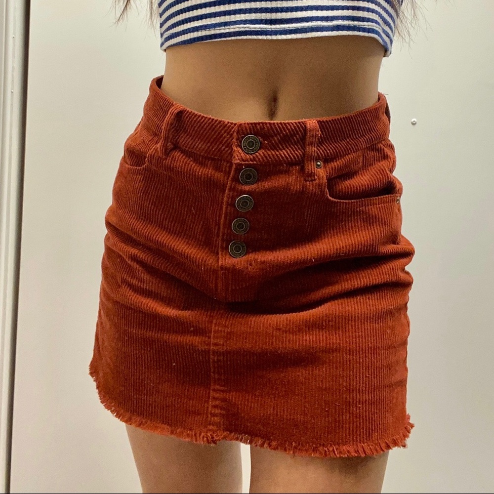 burnt orange corduroy button down skirt!